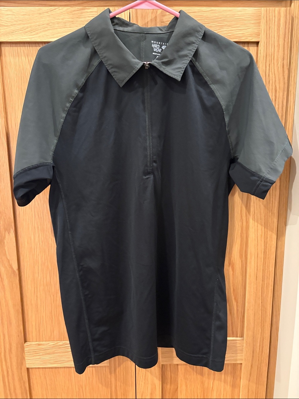 Men's Medium Mountain Hard Wear Short Sleeve Polo Shirt in Black and Charcoal.